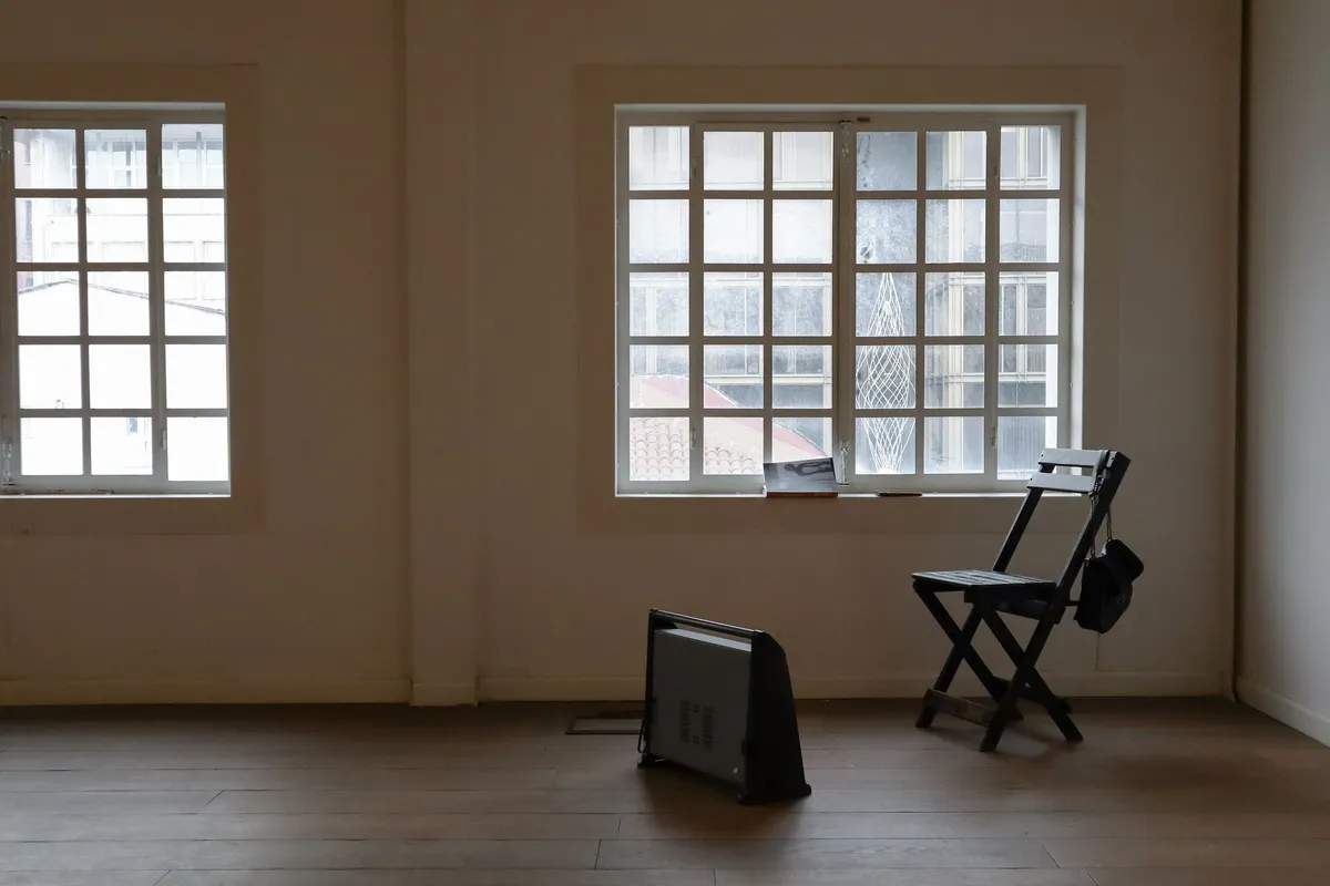 Two chairs facing each other in a quiet therapy room, where work with a porn addiction therapist happens